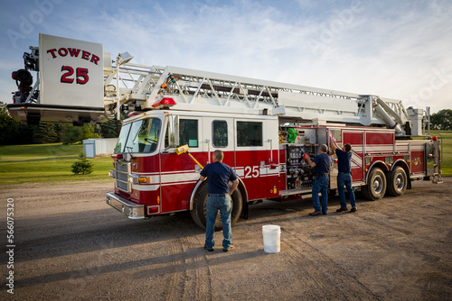 Firetruck washed by firefighters, New Holstein, Wisconsin, USA photo
