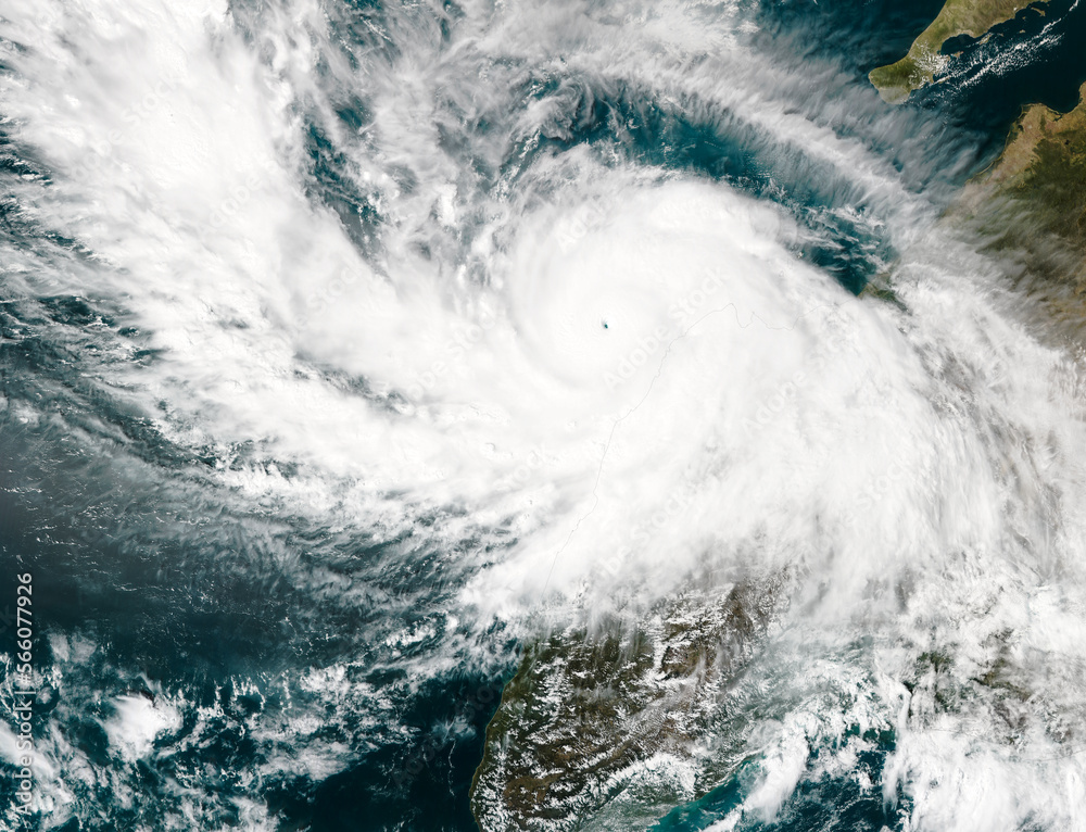 Hurricane from space, satellite view. Hurricane catastrophe. Elements of this image furnished by NASA. Selective focus. Noise and grain included.