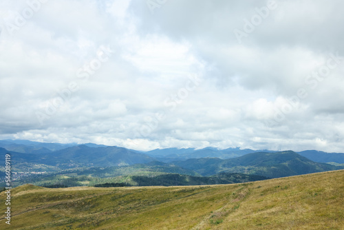 Picturesque view of mountain landscape and cloudy sky © New Africa