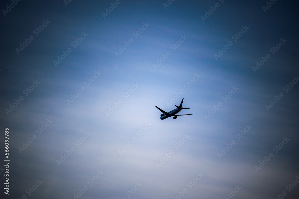 Air plane fly in the blue sky in summer