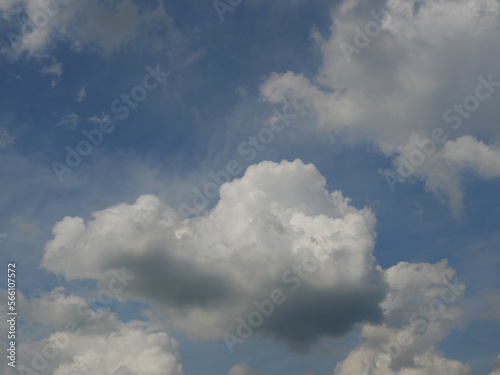 Cumulus cloud on beautiful blue sky in day light , Fluffy clouds formations at tropical zone