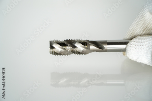 screw hand tap cutting tool. Right spiral flute.taps and dies spiral flute. photo