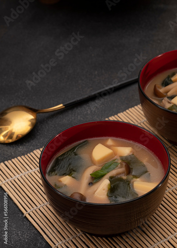 Japanese miso soup in bowl with a spoon. Selective Focus. Close Up