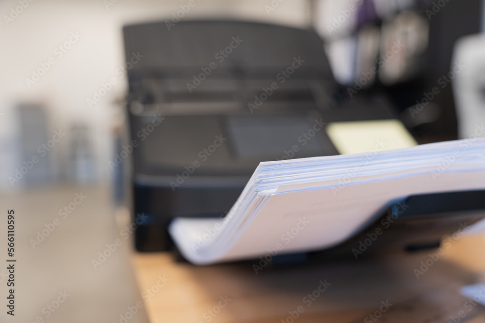 Desktop paper document scanner with stack of documents Desktop paper document scanner with stack of documents