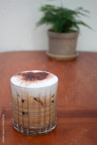 Iced coffee with micro foam in coffee shop