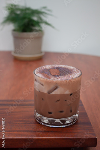 Iced coffee with micro foam in coffee shop