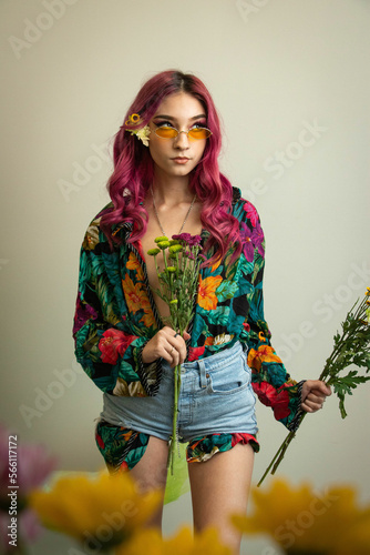 flowers model flower child pink hair retro vintage fashion editorial floral nature hippie hippies chick studio modeling fashion photography studio grey background young woman women teenager 1960s 60s 