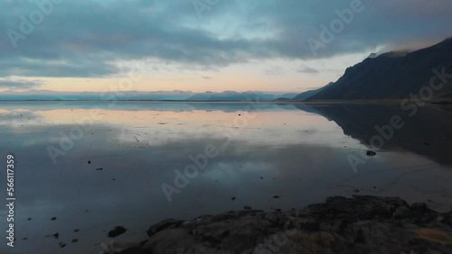 Wallpaper Mural Volcanic Stokksnes mountains reflected in Icelandic icy seascape aerial view Torontodigital.ca
