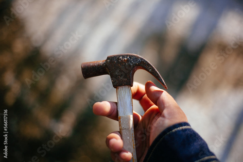 man holding hammer