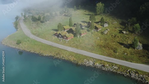 Lovatnet glacier lake and Breng seter historical farm houses. Drone footage. Norway photo