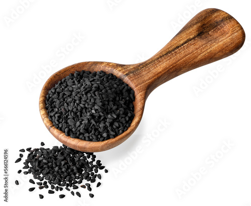 black cumin seeds in round scoop isolated on white