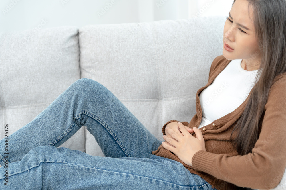 stomach ache. Asian women have abdominal pain, indigestion, gastritis, menstrual cramps, flatulence, diarrhea, distention, colon cancer, belly inflammation problem, suffer food poisoning, abdomen stomach ache. Asian women have abdominal pain, indigestion, gastritis, menstrual cramps, flatulence, diarrhea, distention, colon cancer, belly inflammation problem, suffer food poisoning, abdomen