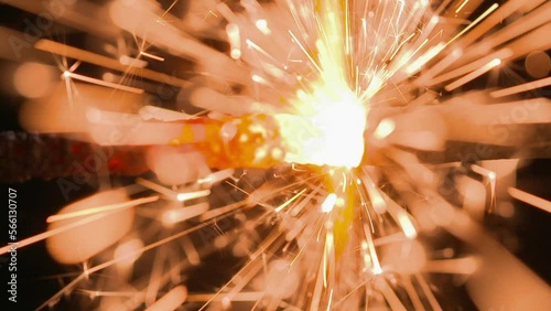 Sparkler buring in slow motion closer up. photo