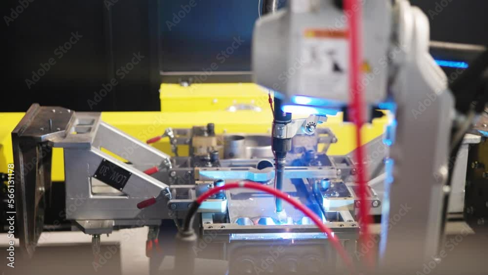 colse up shot of an automated welding machine, welding a complex steel frame colse up shot of an automated welding machine, welding a complex steel frame