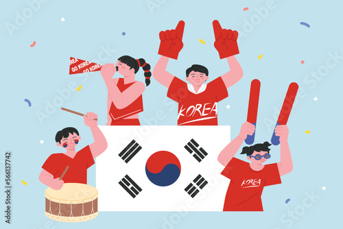 Korean football cheering team Red Devils. With the Taegeukgi in the center, people are cheering with cheering tools around.