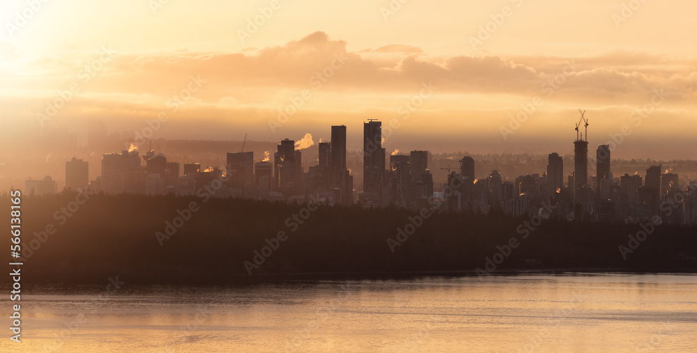 Modern City Skyline in Downtown Vancouver, British Columbia, Canada. Golden Winter Sunrise Sky.