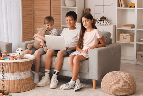 Little friends using laptop...