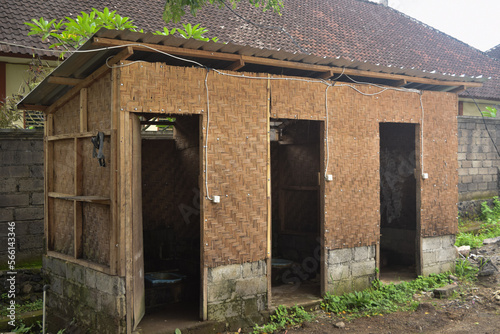 temporary public toilet made of woven wood