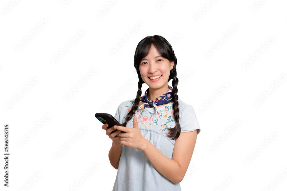 Portrait of happy beautiful young asian woman in denim dress using a smartphone on white background. studio shot Portrait of happy beautiful young asian woman in denim dress using a smartphone on white background. studio shot