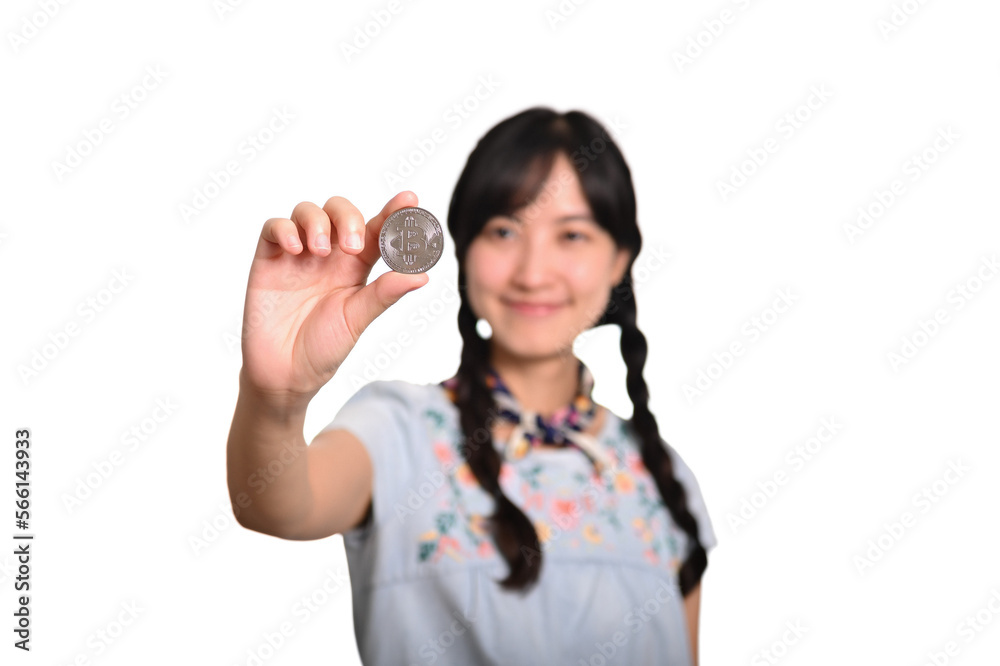 Portrait of beautiful happy young asian woman in denim dress holding crypto currency coin on white background. Portrait of beautiful happy young asian woman in denim dress holding crypto currency coin on white background.