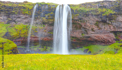 Amazing Seljalandsfoss waterfall with rainbow - Iceland