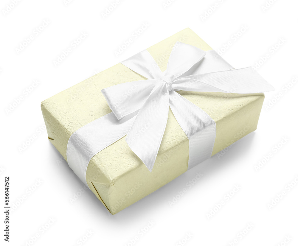 Gift box wrapped in yellow paper on white background Gift box wrapped in yellow paper on white background