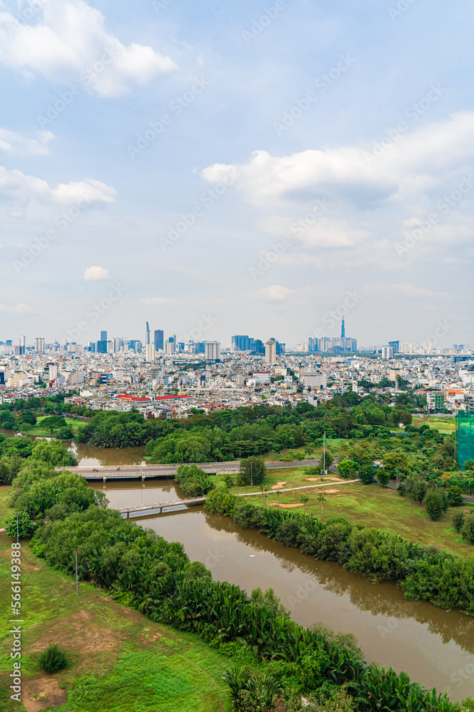 Ho Chi Minh city, Vietnam - 20 Jan 2023: View from District 7 to the city center. See Bitexco tower and Landmark 81, IFC One,... famous towers in Vietnam. One of the developed cities in Vietnam.