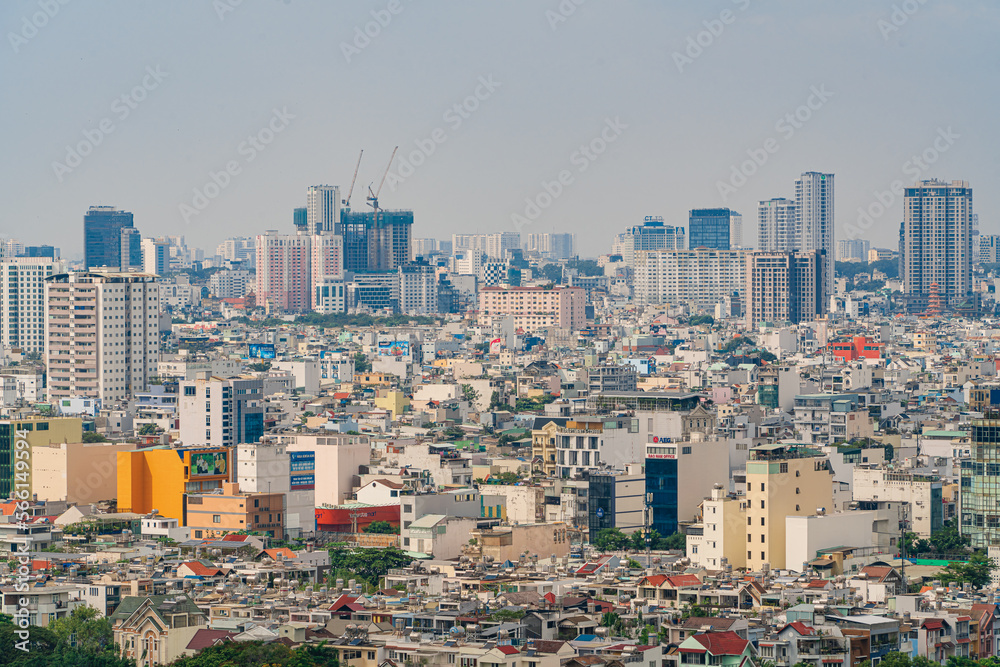 Ho Chi Minh city, Vietnam - 20 Jan 2023: View from District 7 to the city center. See Bitexco tower and Landmark 81, IFC One,... famous towers in Vietnam. One of the developed cities in Vietnam.