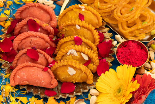 Traditional Indian Mithai Rose Gujiya, Kesar Gujiya Also Called Gujia, Ghughra, Karanji, Somas, Garijalu, Kajjikayalu, Karigadubu, Gunjiya, Pedakiya, Karjikayi Stuffed With Khoya, Mawa, Malai, Mishri photo