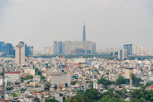 Ho Chi Minh city, Vietnam - 20 Jan 2023: View from District 7 to the city center. See Bitexco tower and Landmark 81, IFC One,... famous towers in Vietnam. One of the developed cities in Vietnam. © Quang Ho