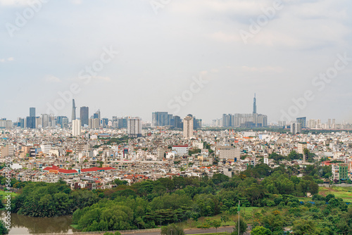 Ho Chi Minh city, Vietnam - 20 Jan 2023: View from District 7 to the city center. See Bitexco tower and Landmark 81, IFC One,... famous towers in Vietnam. One of the developed cities in Vietnam. © Quang Ho