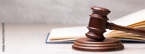 Law and justice concept. Mallet gavel of the judge, scales of justice, books. Copy space for text