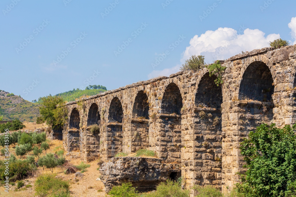 Roman aqueduct at Aspendos, part of water supply ancient system. Antalya region, Turkey (Turkiye). History and archaeology background
