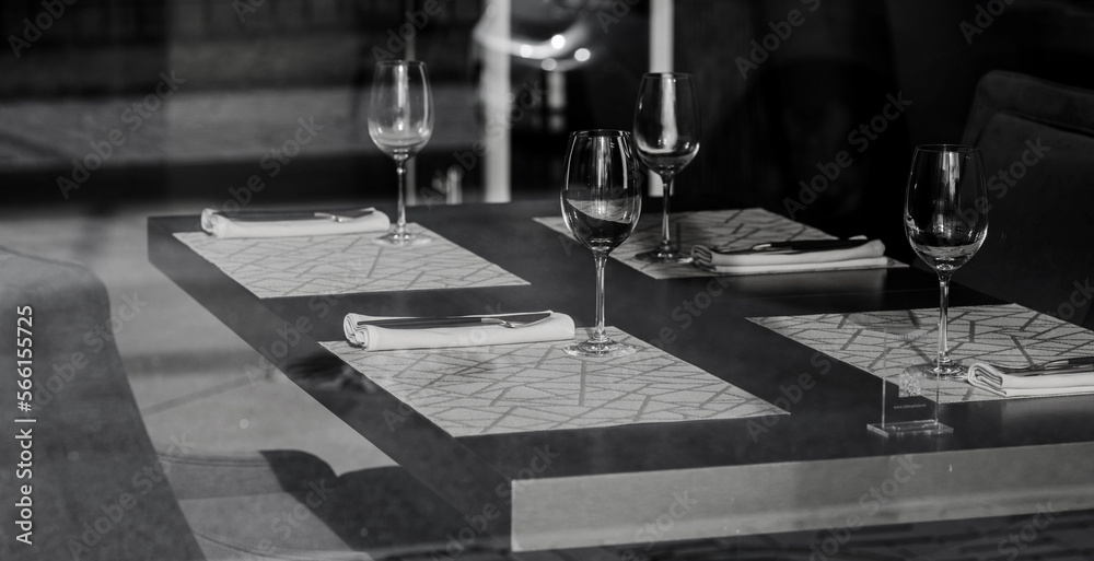 restaurant table with empty glasses