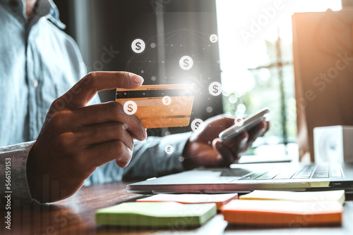 Online banking businessman using smartphone with Icon Fintech and Blockchain concept photo