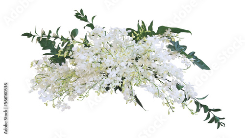 Tropical plant bush floral arrangement with white dendrobium orchids tropical flowers and tropical leaves philodendron and ruscus leaves.
