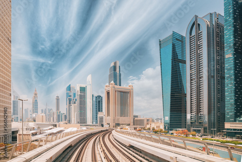 Photography Metro road among glass skyscrapers in Dubai