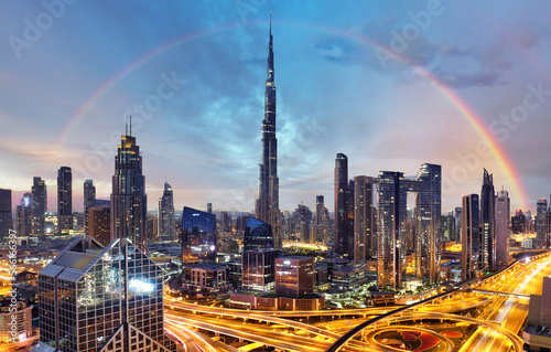 Fényképezés Rainbow over Dubai skyline with Burj Khalifa, United Arab Emirates