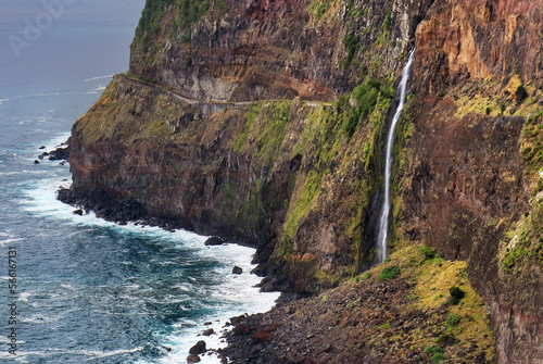 Beautiful wild coast scenery view with Bridal Veil Falls (Veu da noiva) at Ponta do Poiso in Madeira Island. Near Porto Moniz, Seixal, Portugal. photo