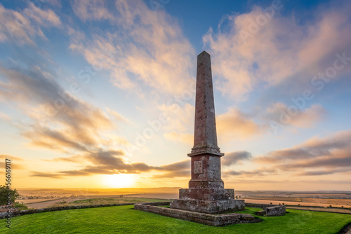 Balfour Monument in front of sky at sunset, East Linton, Scotland photo
