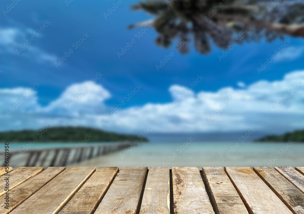 Wooden table top on the beach or sea.Party on the beach  sunshine time concept.For montage product display or design key visual layout.View of copy space.