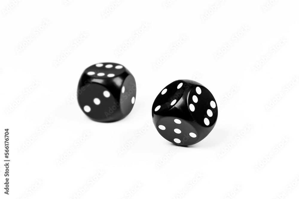 Two poker dice lie on a white background Two poker dice lie on a white background