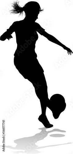 A female soccer football player woman in silhouettes