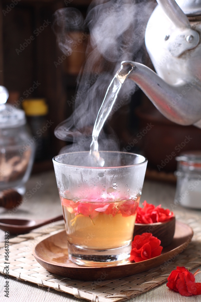 Tea is an aromatic beverage prepared by pouring hot or boiling water ...
