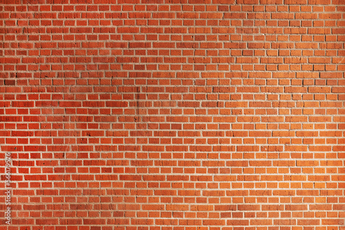 Large orange exterior brick wall pattern as urban background