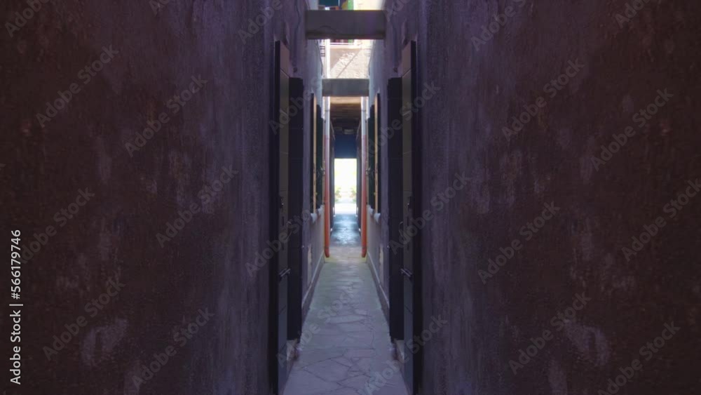 Road between two narrow old walls Road between two narrow old walls