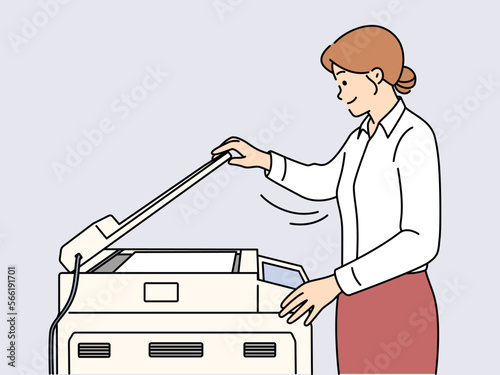 Businesswoman make document copy on machine 