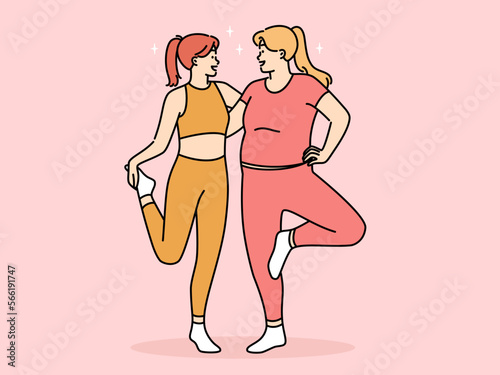 Smiling diverse girls training together 