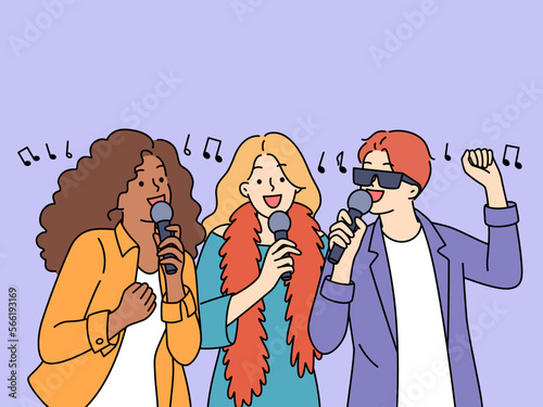Smiling people have fun singing karaoke 