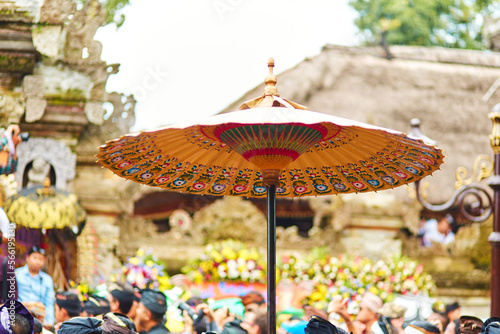 Rite of cremation of the royal family on the island of Bali. Topla people carry the throne with the members of the royal family photo